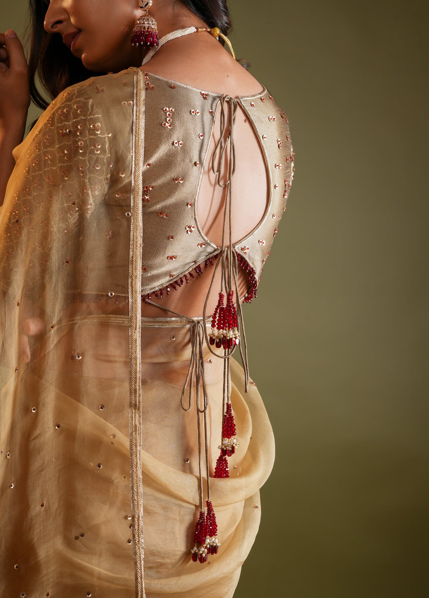 Antique Gold Saree with Maroon & Gold Embellished Blouse