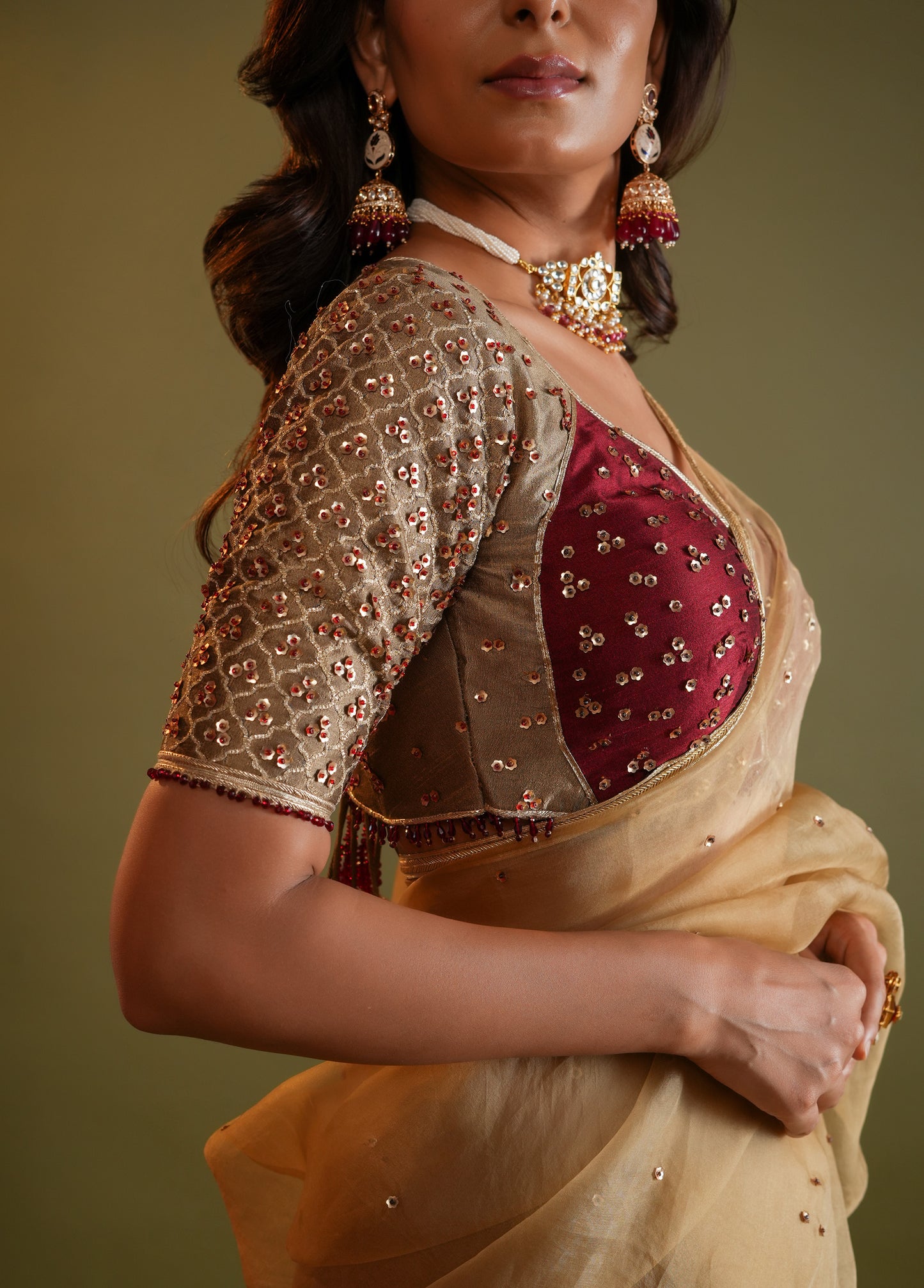 Antique Gold Saree with Maroon & Gold Embellished Blouse