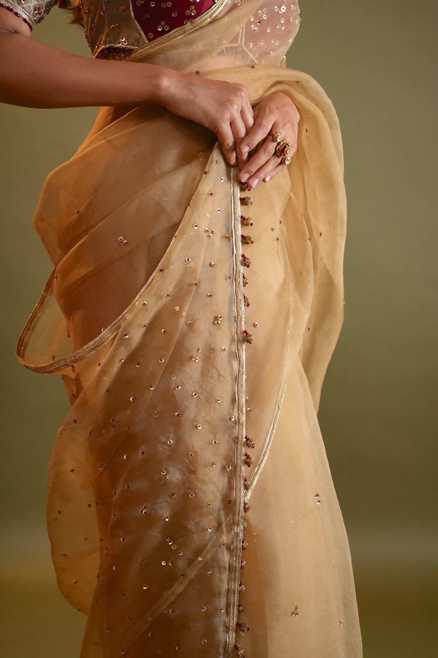 Antique Gold Saree with Maroon & Gold Embellished Blouse