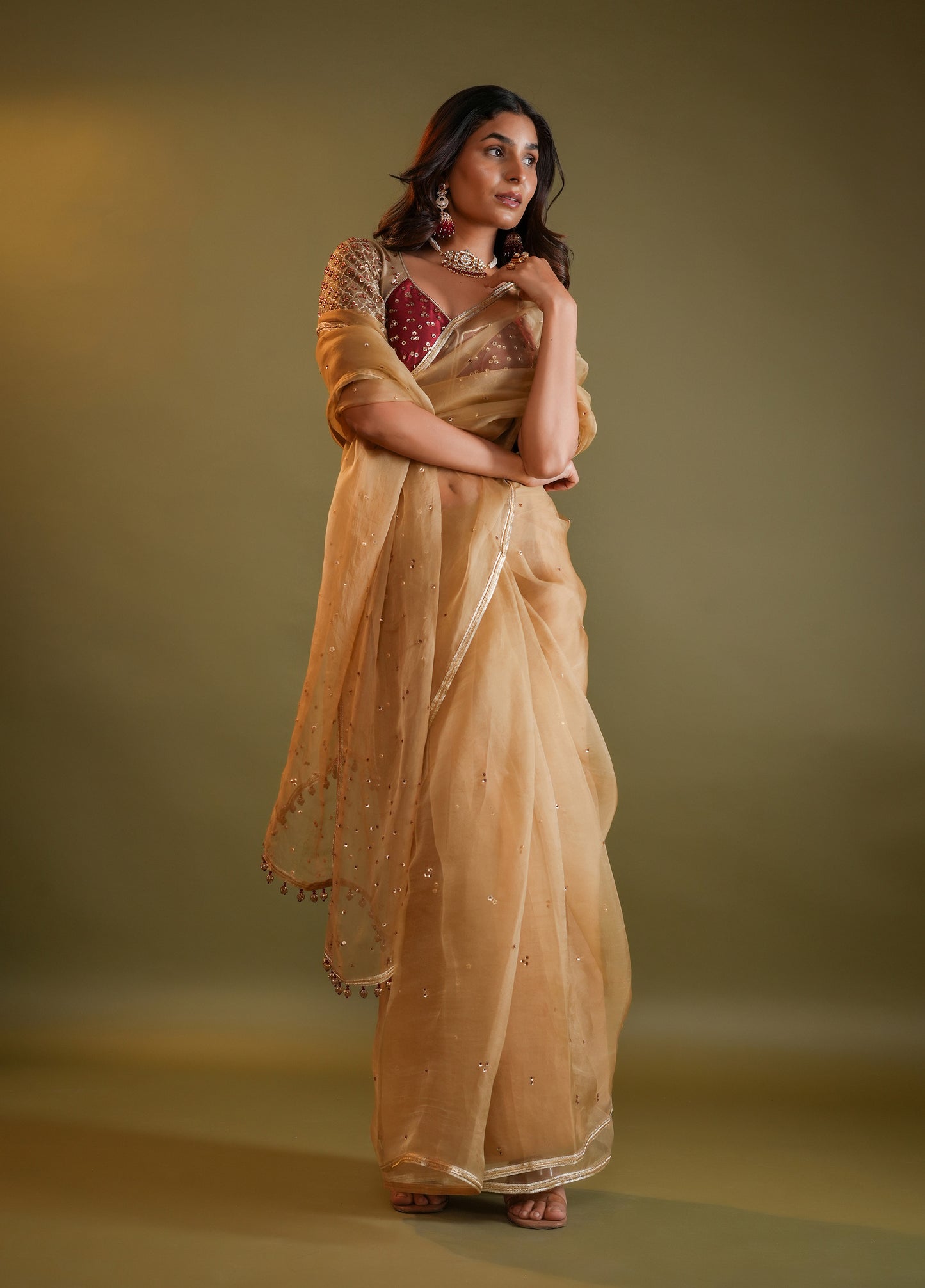 Antique Gold Saree with Maroon & Gold Embellished Blouse